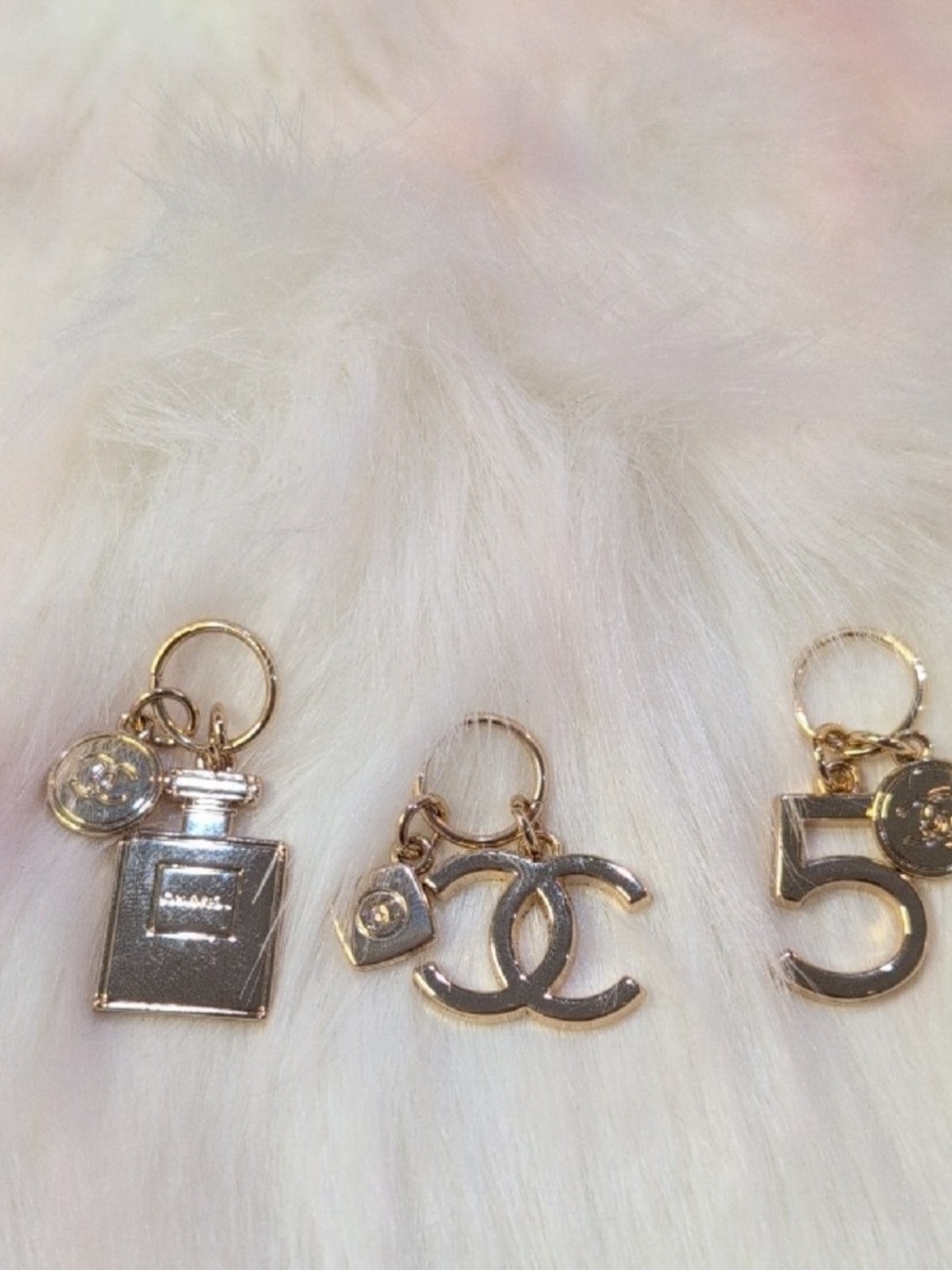 Gold Charm Keyring Set Of 3 - Perfume Bottle, Interlocking Logo, and '5' Charm